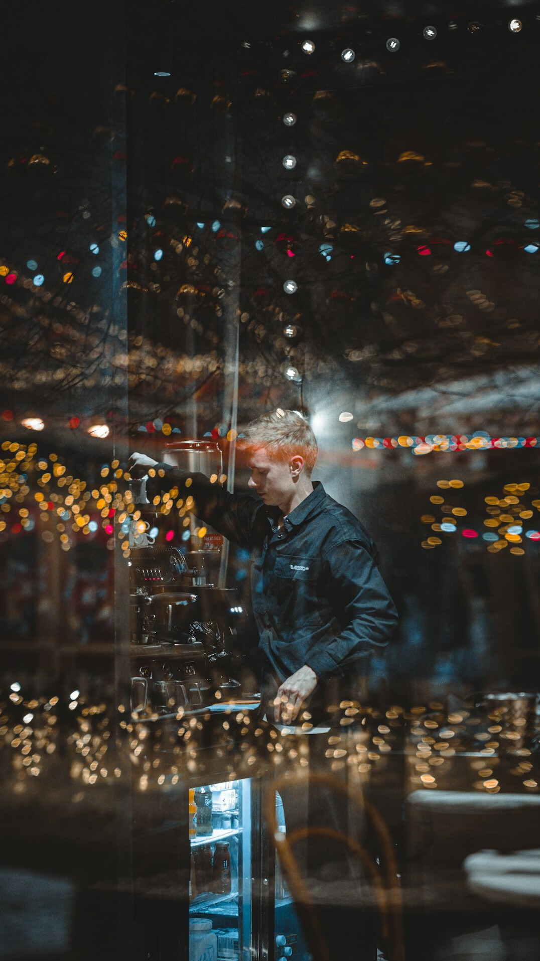 Camera operator working with a studio broadcast camera